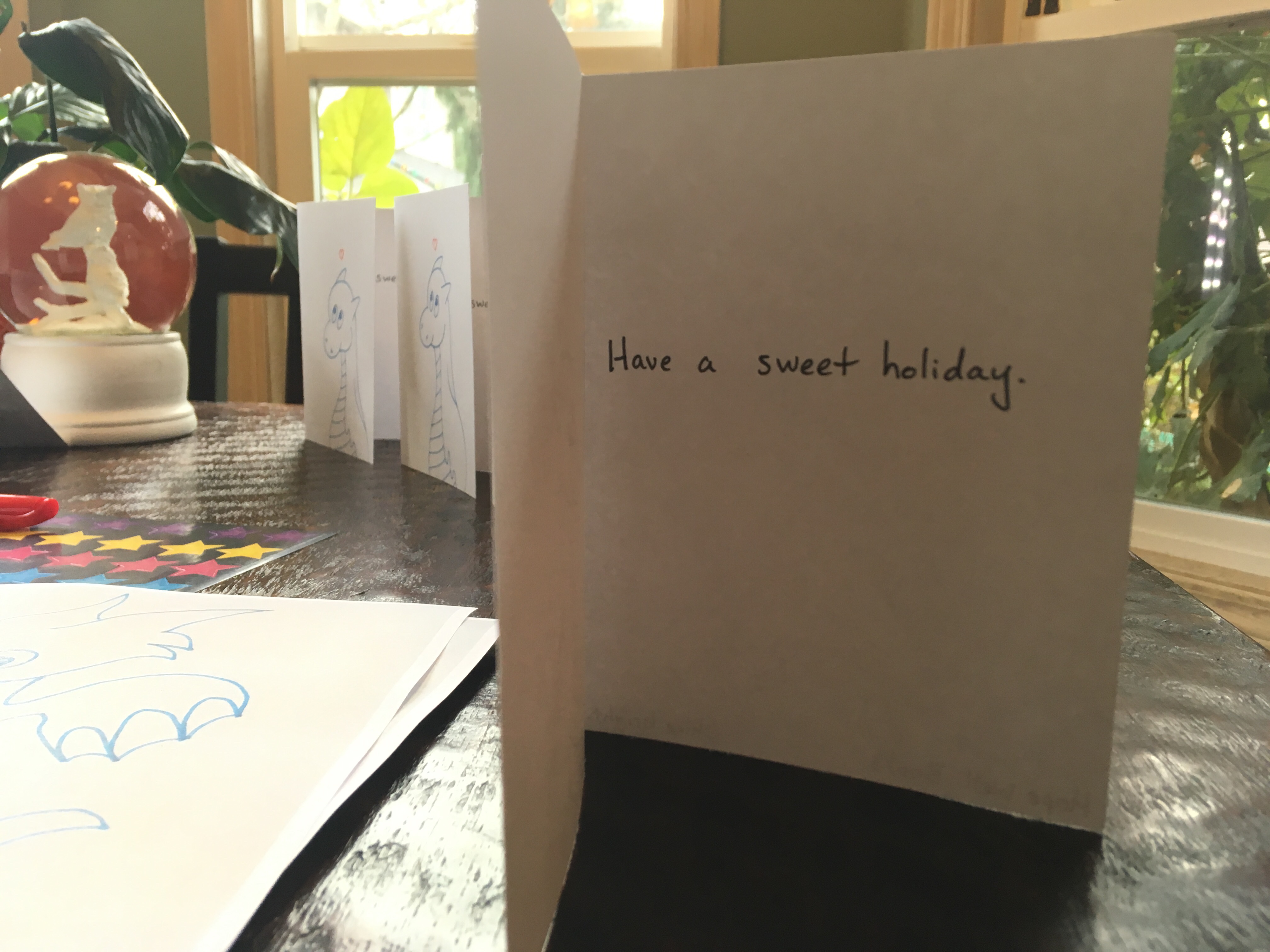 Inside of white card says have a sweet holiday
