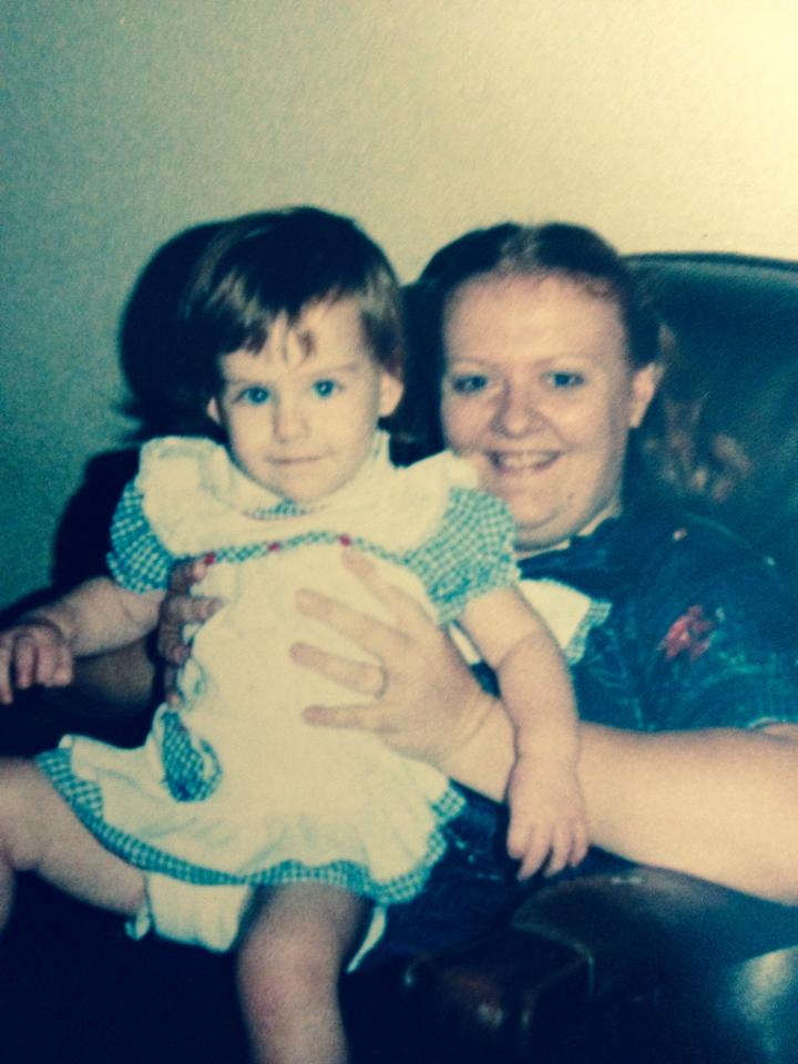Marilyn holding me as a toddler