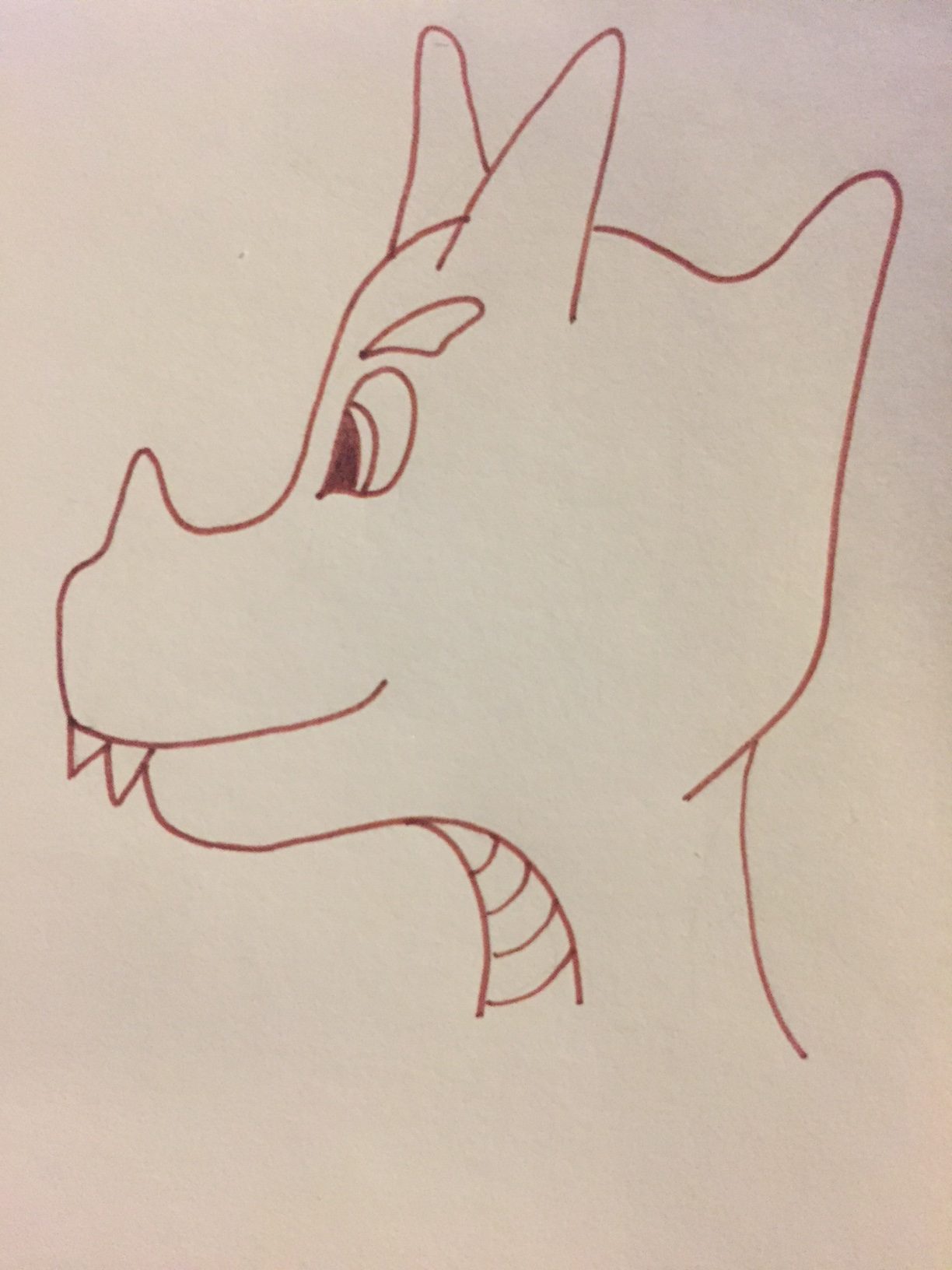 dragon head in brown ink